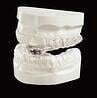 Dental treatments for snoring and apnoea can be a 'mono-block' or multi-part device.